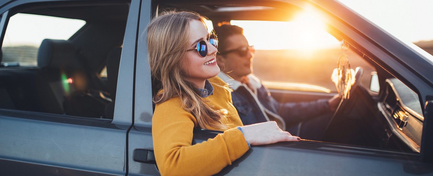 Young hipster couple enjoy sunset roadtrip